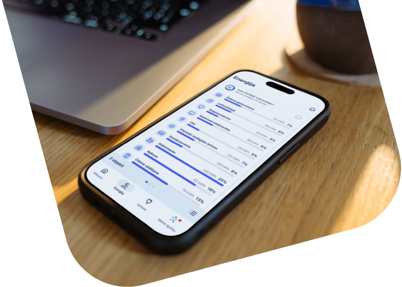 ignitis mobile app opened in a phone on a table 